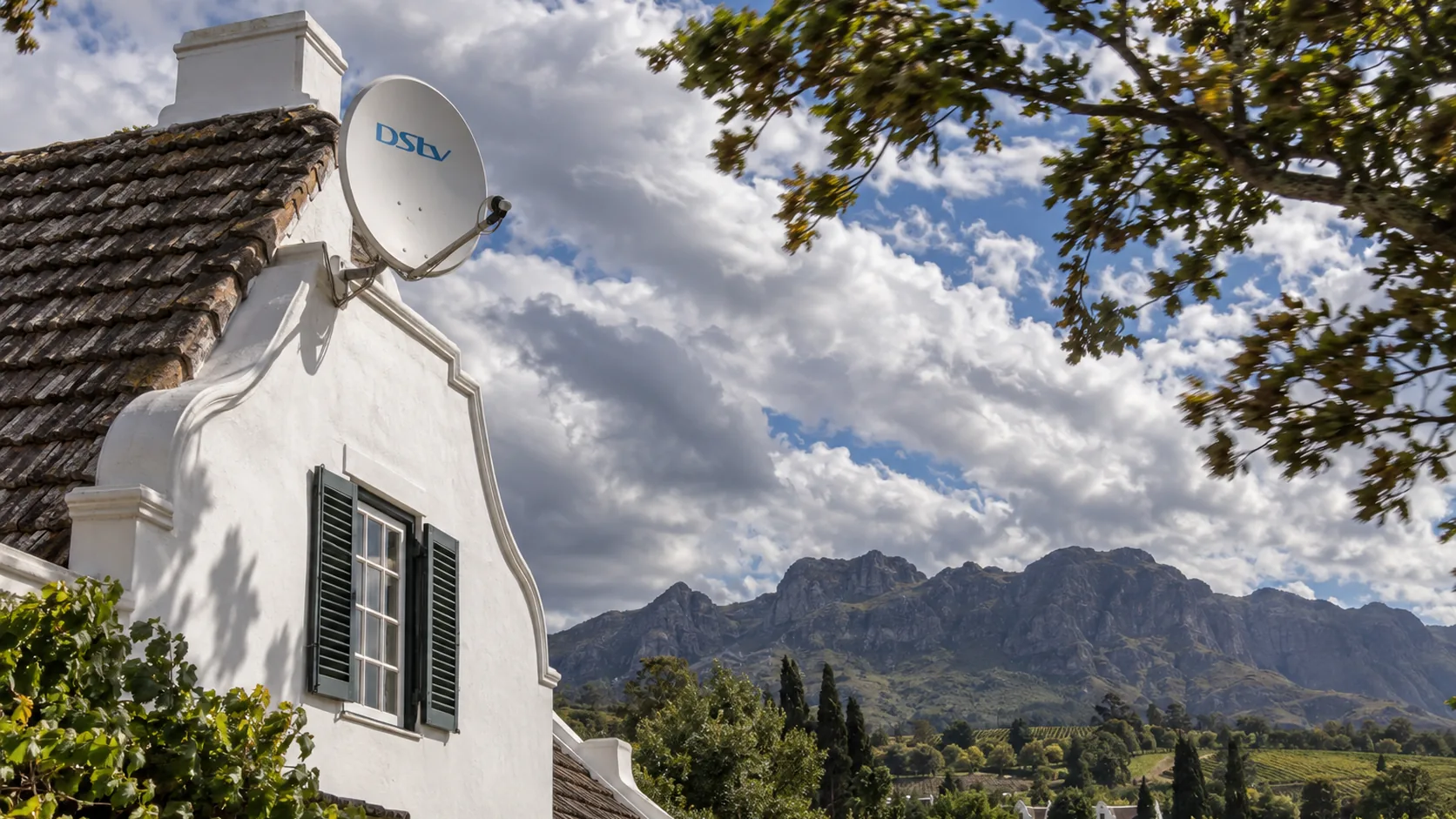 DSTV dish on a roof